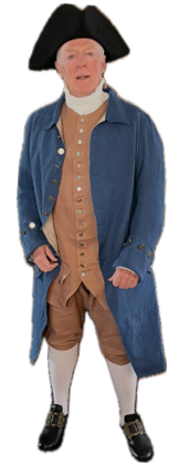 An older man wearing colonial-era clothing, including a black tricorn hat, a long blue coat, a tan vest and breeches, white stockings, and black shoes with buckles.